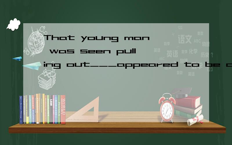 That young man was seen pulling out___appeared to be a handg